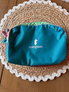 NWOT cotopaxi teal travel pouch with lime trim